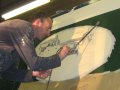 Our painter starts the air brushing of the image
